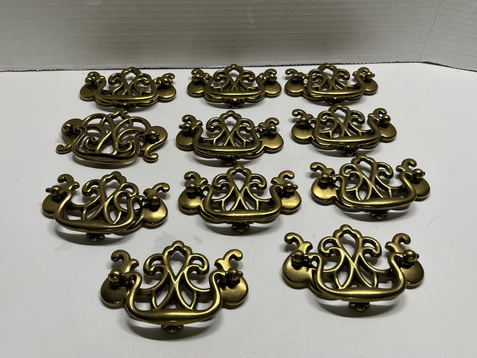Vintage Lot (11) NOS KBC Brass Plated Chippendale/Batwing Style Drop Bail Pulls