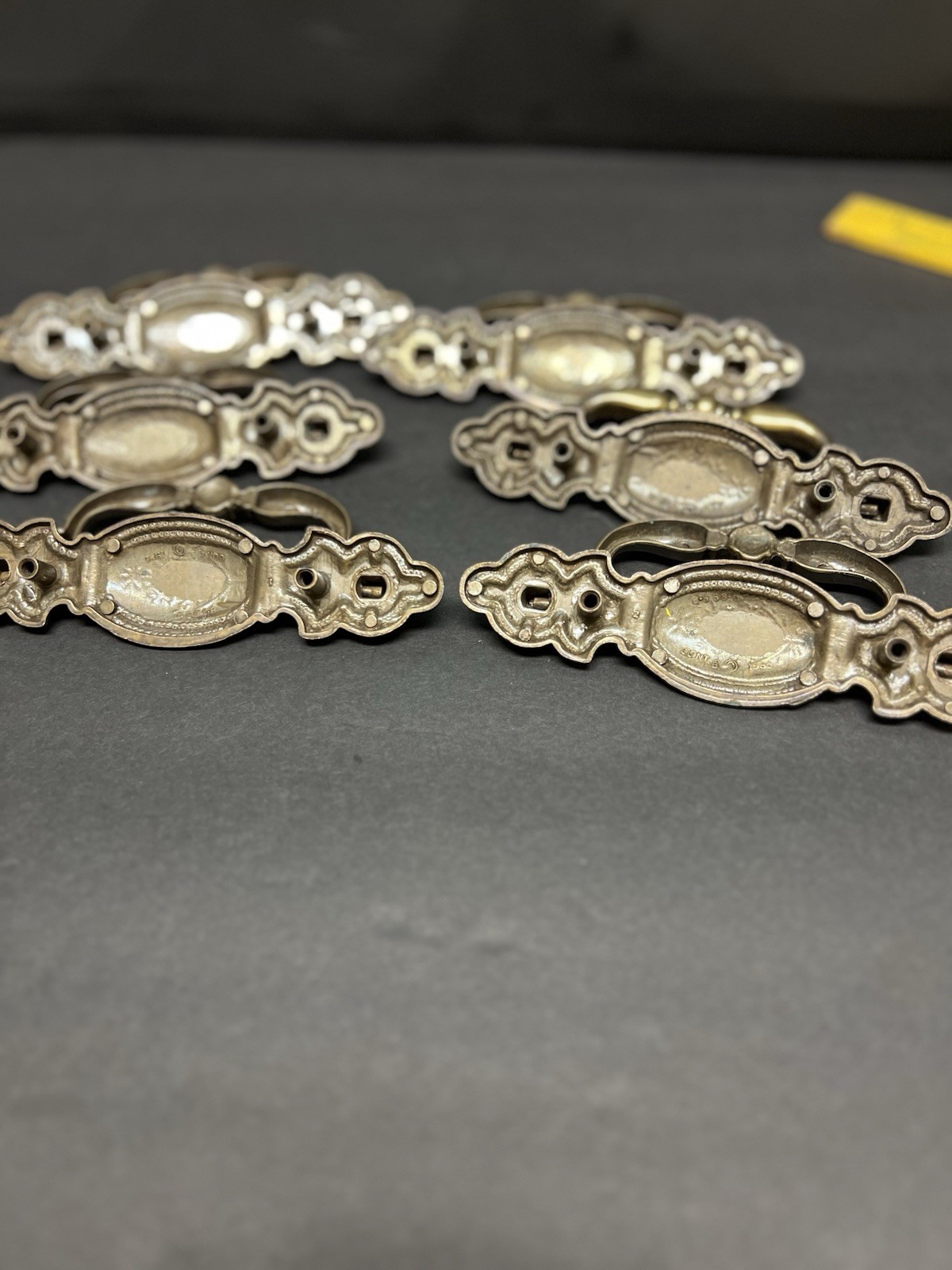 Lot (6) Vintage Bail Pull Features An Ornate Oval Backplate With Floral Design
