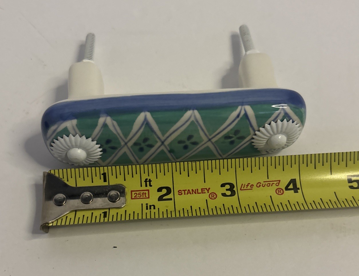 Lot of 4 turquoise /white vintage NOS ceramic floral-design drawer pulls