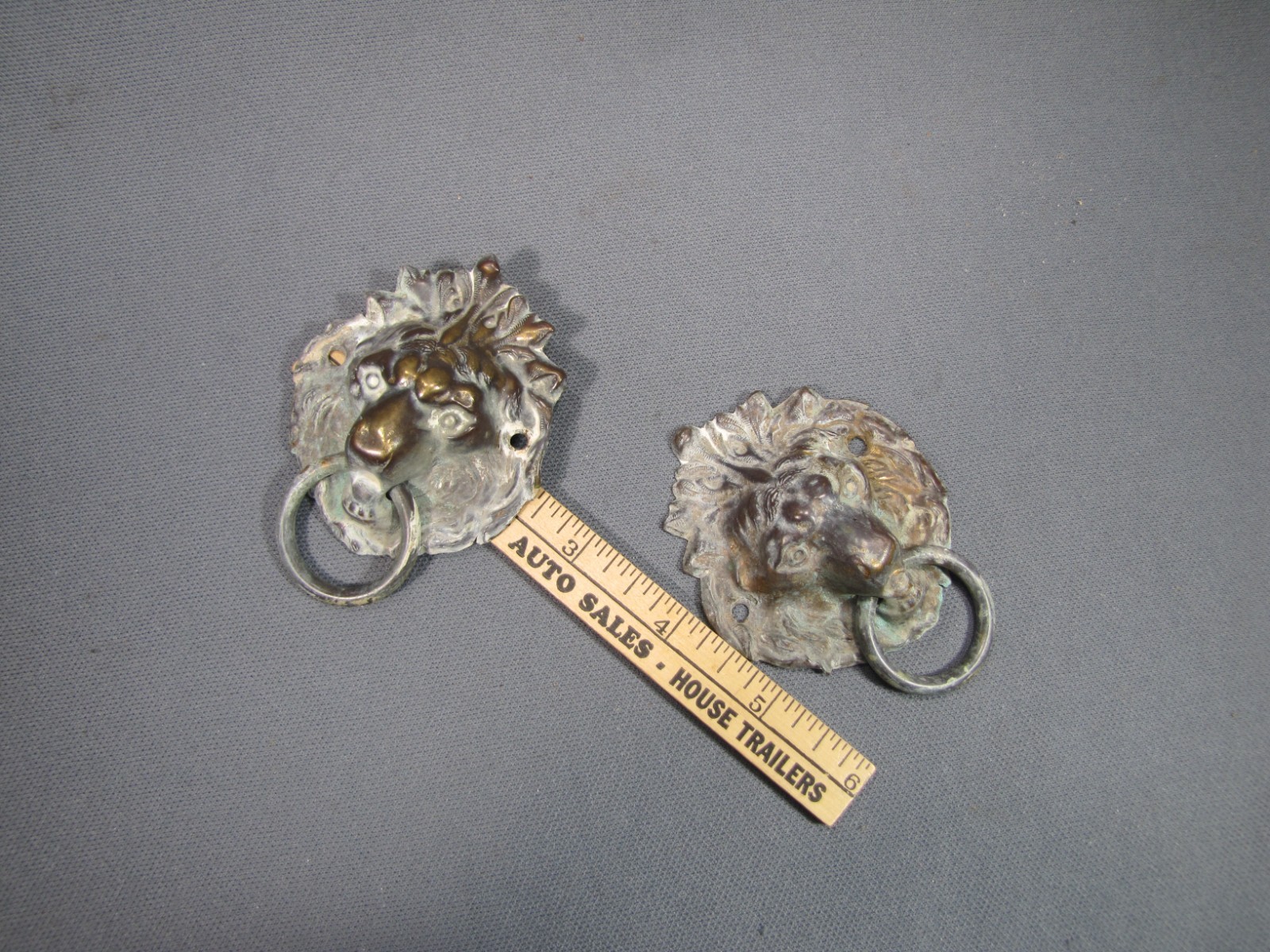 2 antique stamped brass lionhead drawer pulls with Ring