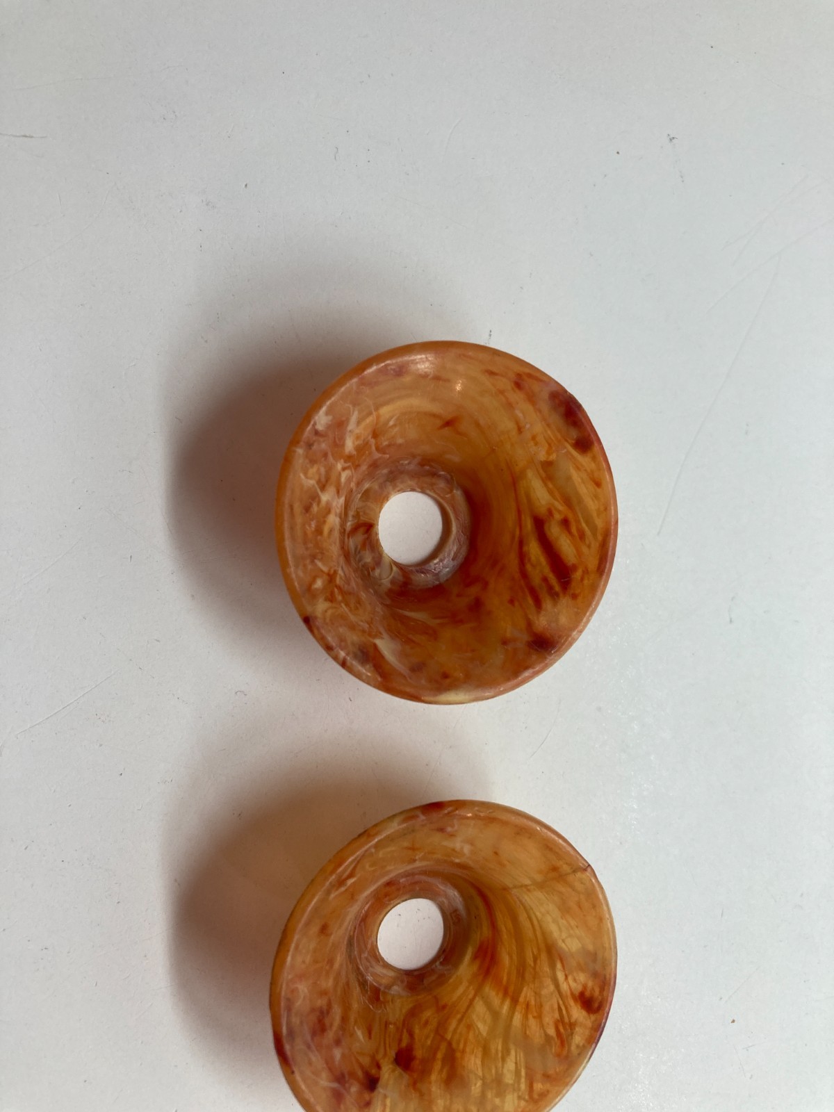 Vintage knob marblelized orange celluloid back plate cups lot of 2