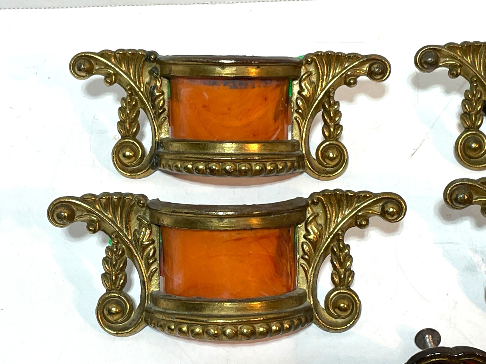 ANTIQUE SET OF FOUR BRASS / BAKELIGHT BUTTERSCOTCH DRESSER HANDLES