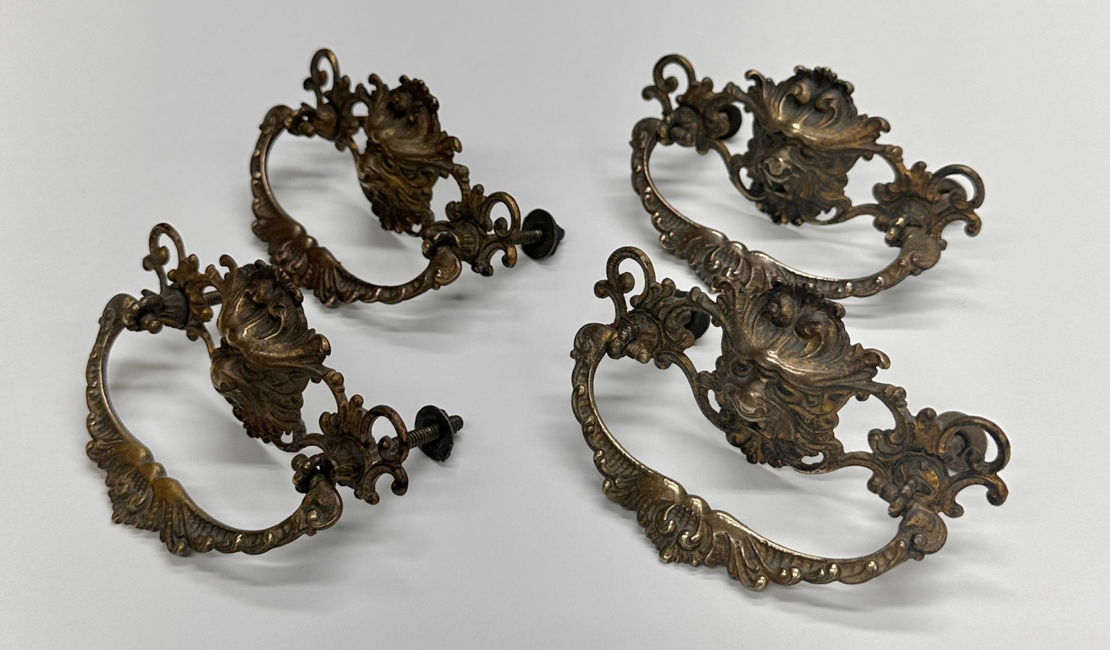 Four Antique North Wind Lion Face Cast Brass Drop Bail Dresser Drawer Pulls
