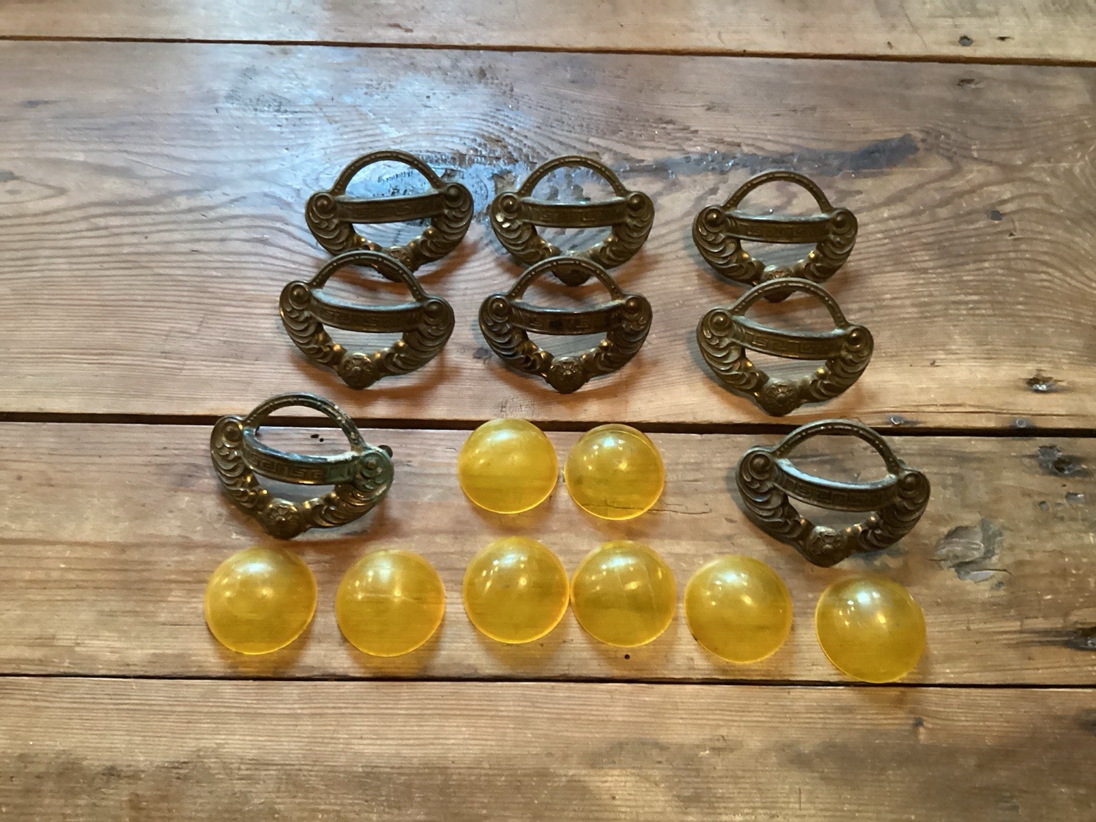 Art Nouveau Style Finger Cup Pulls Gold Bakelite?- Set of 8 – 3″ centers