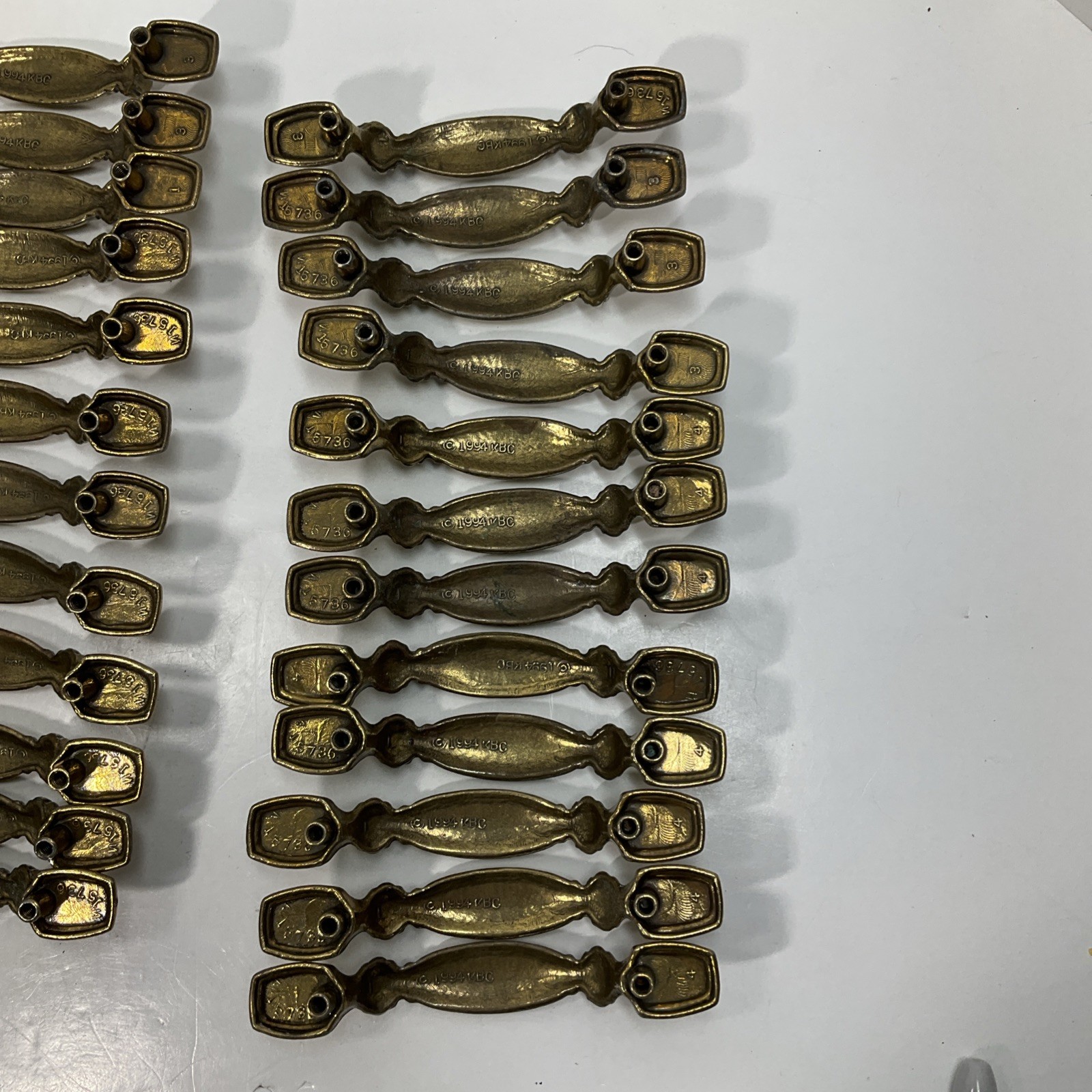 Keeler Brothers Corp. (KBC) 35 Pc. Vintage 1994 brass drawer pulls #N15736 Lot