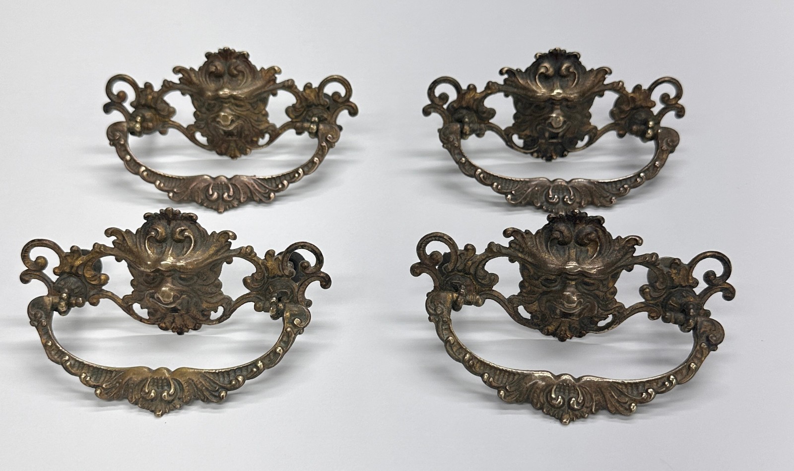 Four Antique North Wind Lion Face Cast Brass Drop Bail Dresser Drawer Pulls