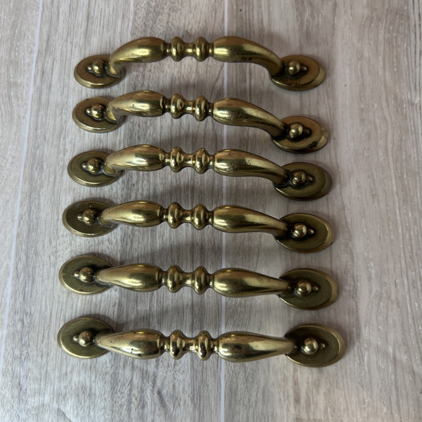 6 Antique Brass Cabinet Handles 3 Inch on Center with Screws.