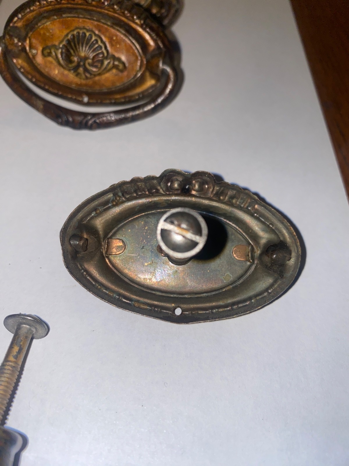 Antique set of 8 Hepplewhite pulls. 6 – 2 3/8″ drop downs and 2 – 1″ knobs .