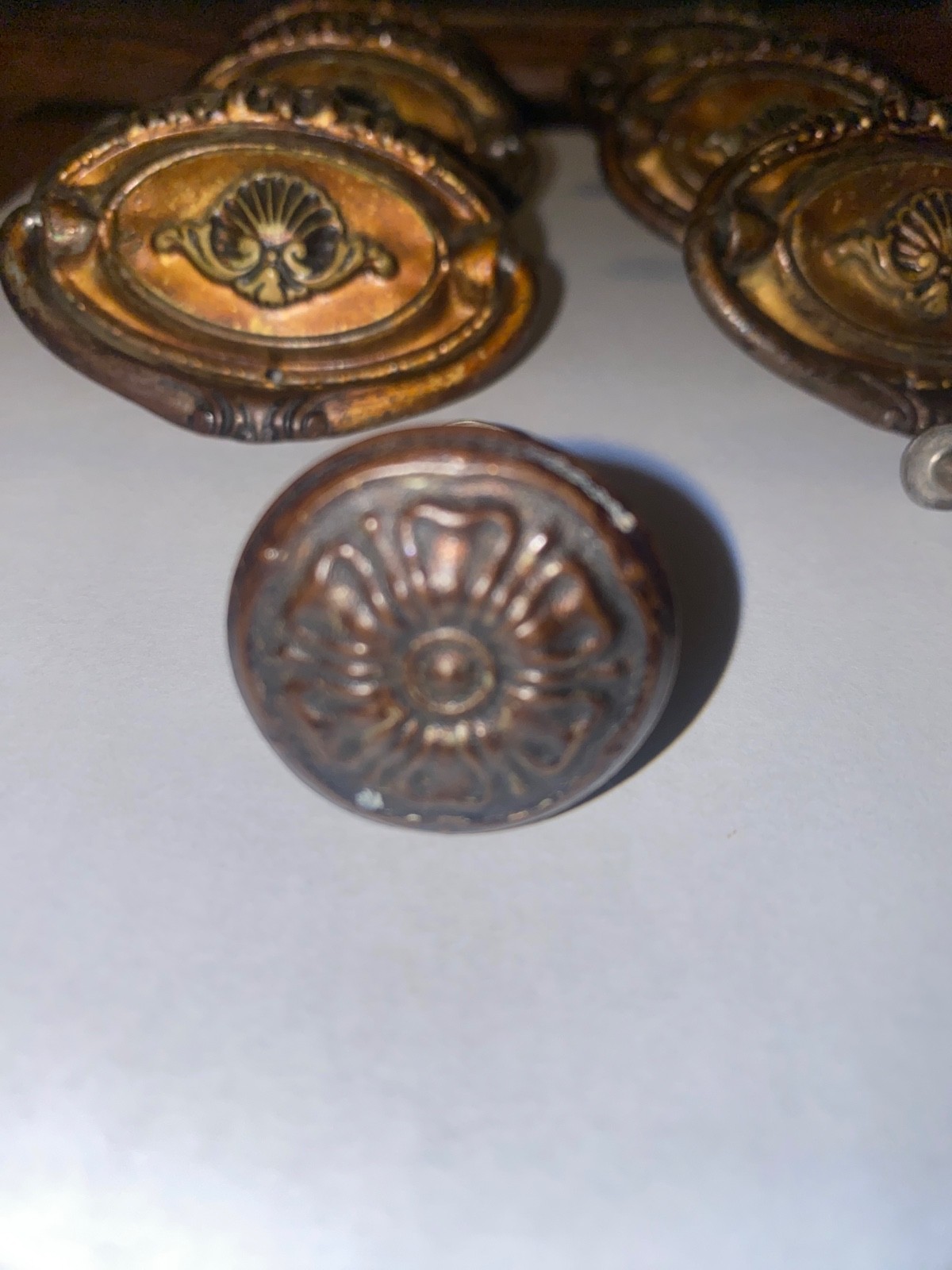 Antique set of 8 Hepplewhite pulls. 6 – 2 3/8″ drop downs and 2 – 1″ knobs .