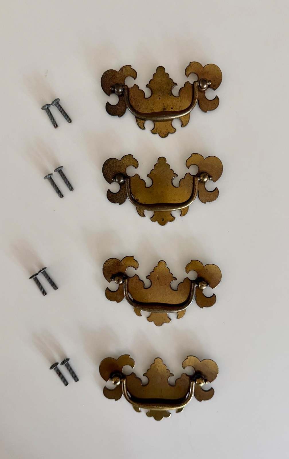 4 antique brass swing handle drawer pulls with screws Chippendale batwing