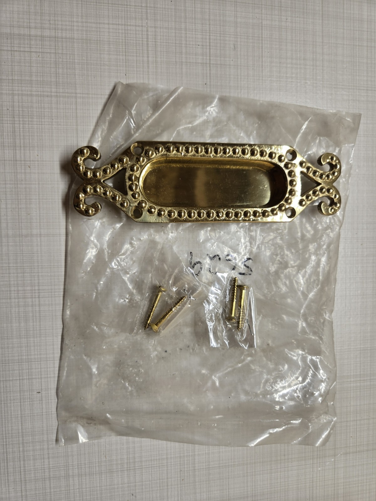 Solid Brass antique flush pull in polished brass with screws