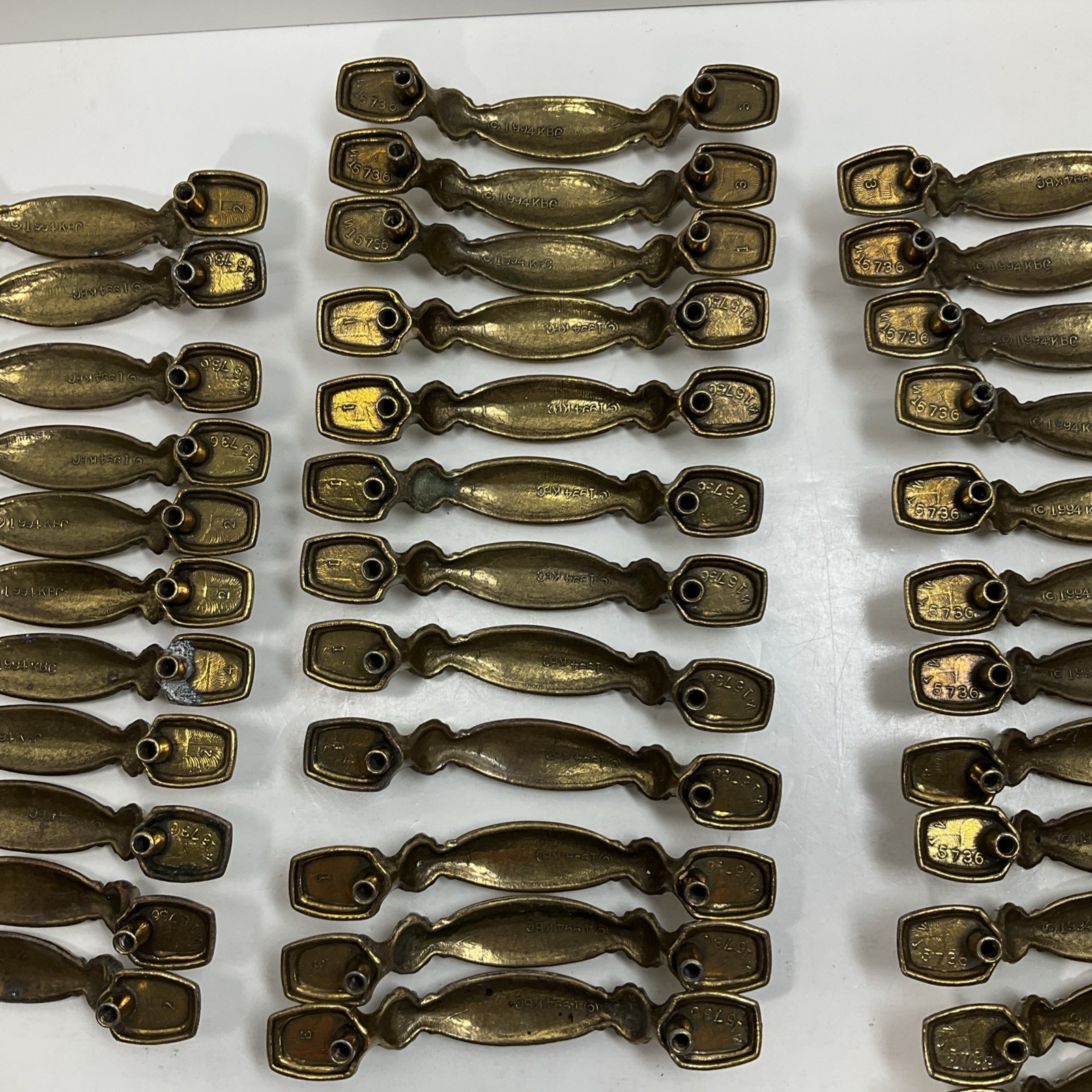 Keeler Brothers Corp. (KBC) 35 Pc. Vintage 1994 brass drawer pulls #N15736 Lot