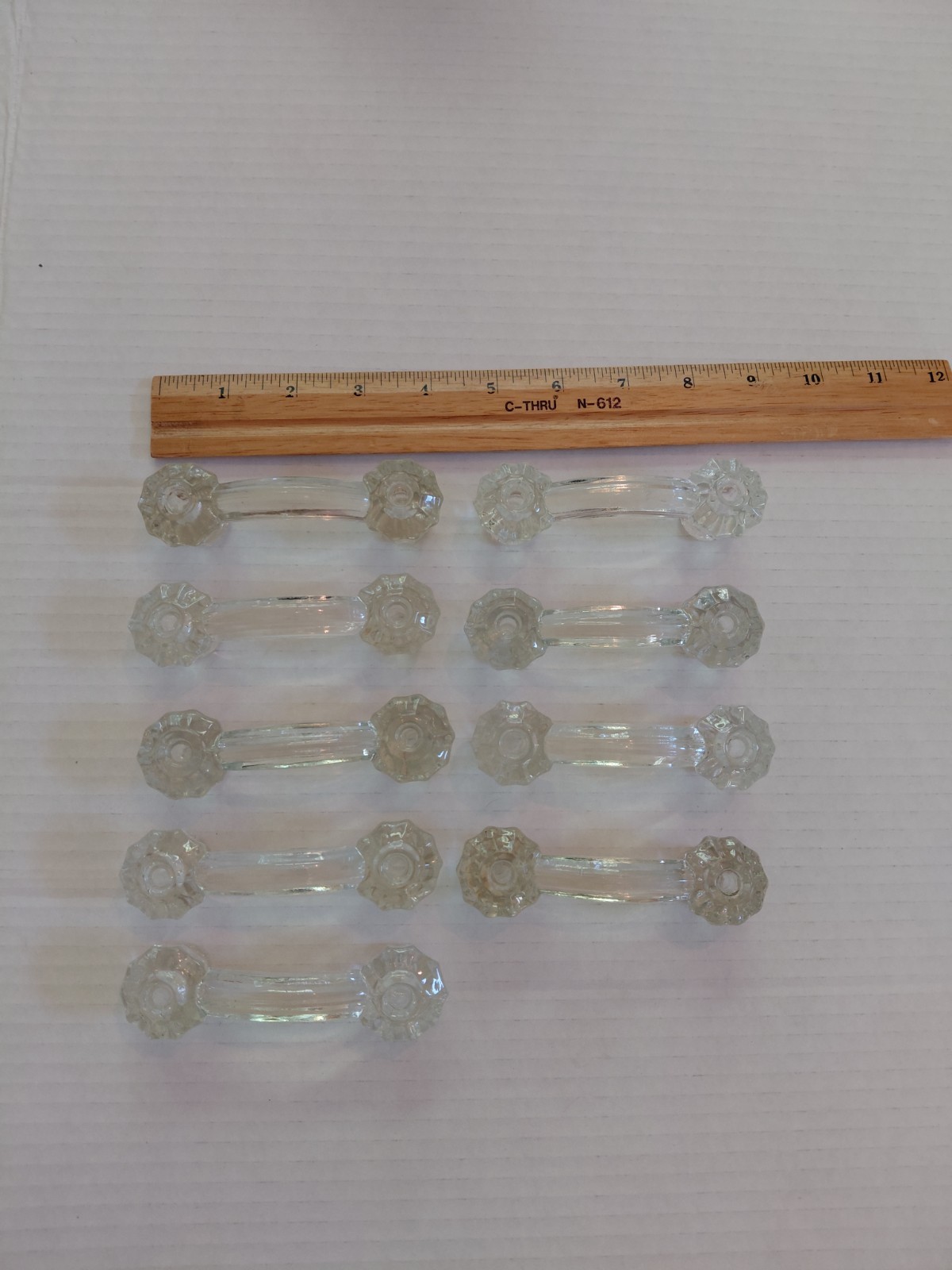 ANTIQUE CLEAR GLASS DRAWER PULLS – LOT OF 9 – 4″ WIDE – 1920’S