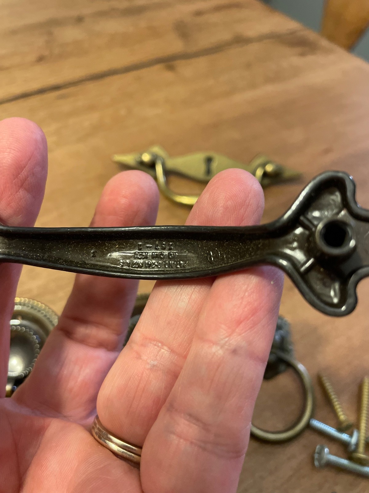 variety of vintage brass pieces, door knock, handles, and pulls never used