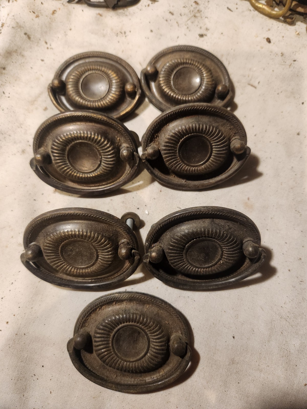 set of 7 old drawer pulls brass plated steel. for traditional style furniture