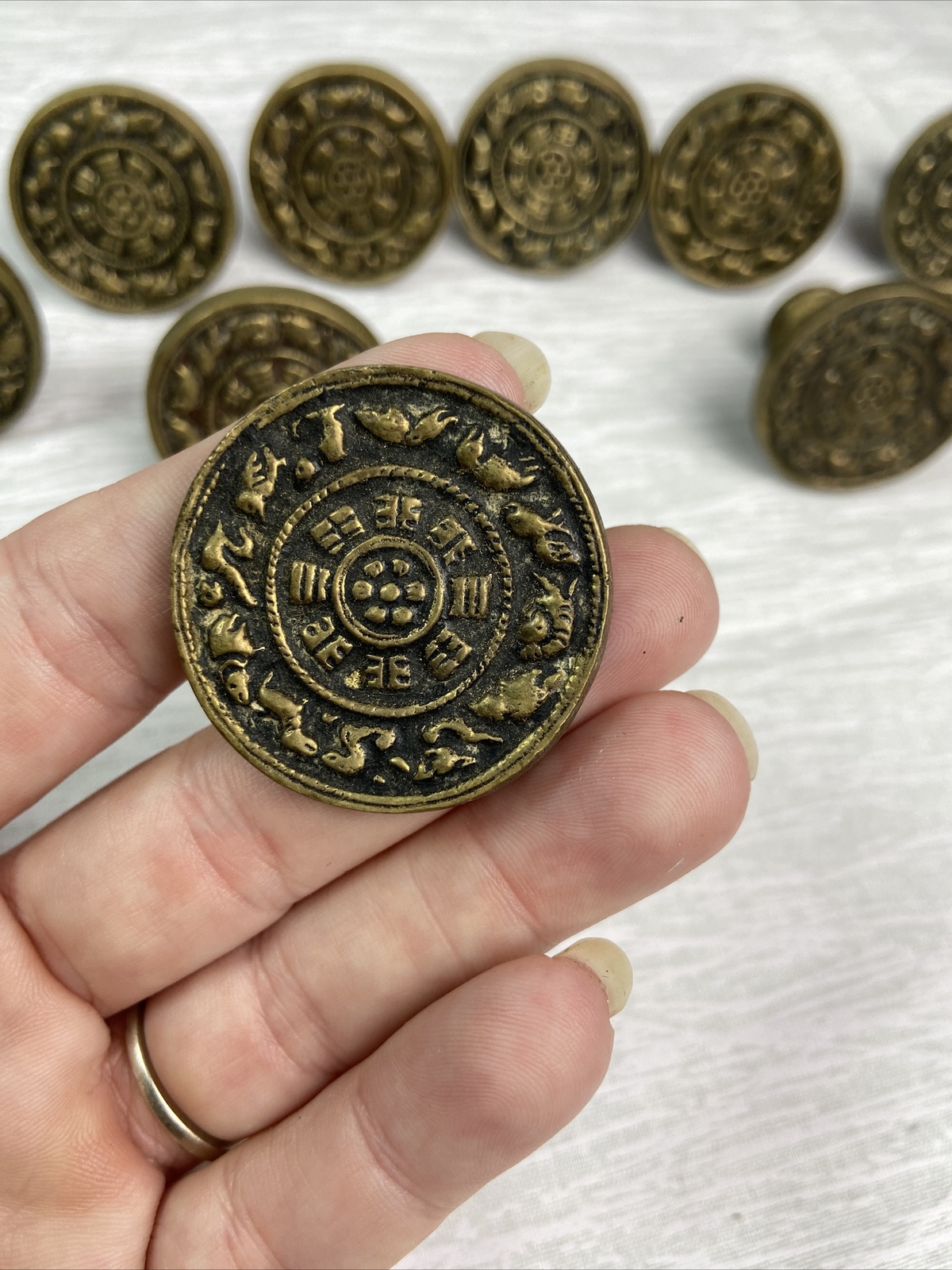 Vintage Set Of 11 Round brass Tibetan intricate design drawer pull knobs