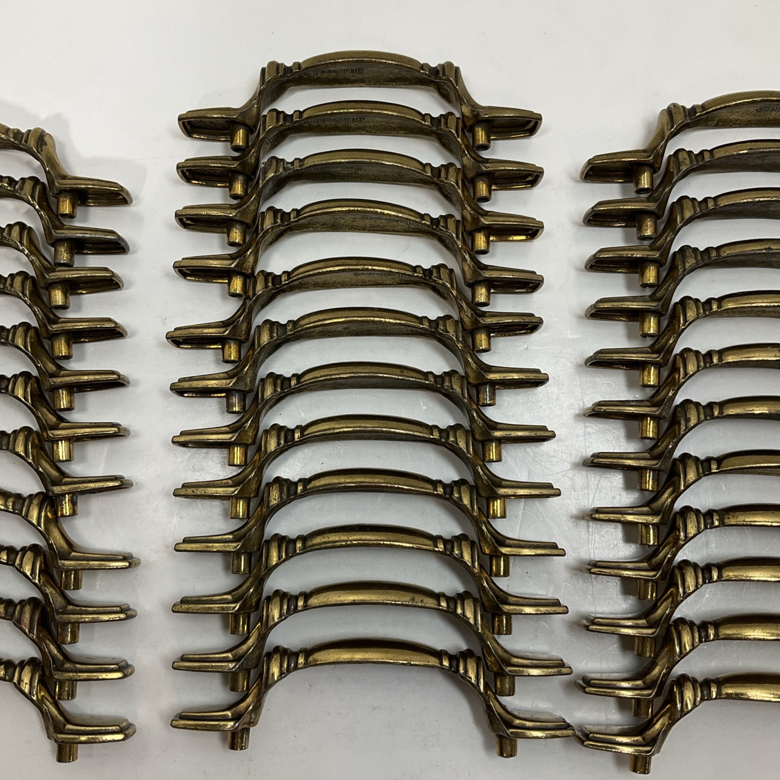 Keeler Brothers Corp. (KBC) 35 Pc. Vintage 1994 brass drawer pulls #N15736 Lot