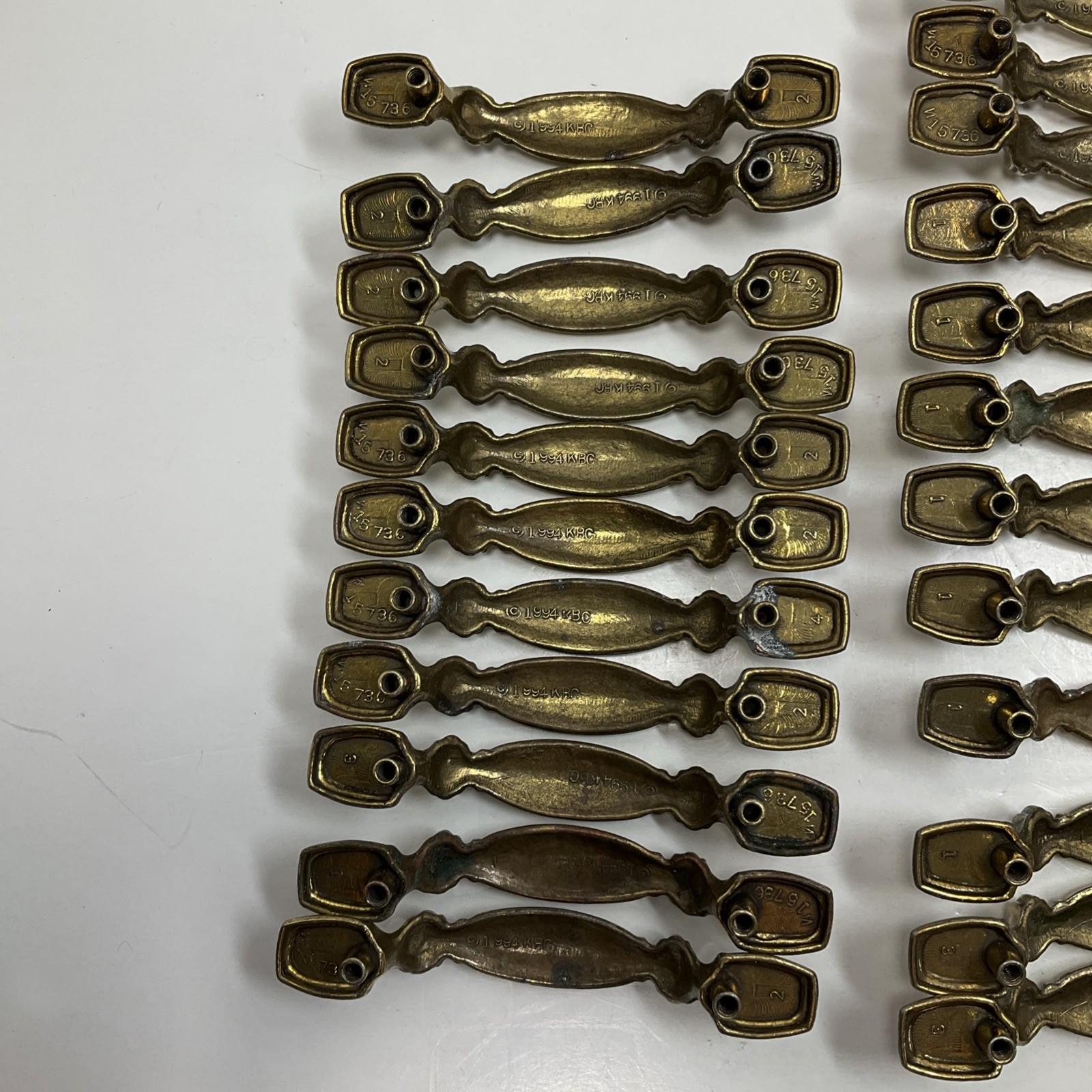 Keeler Brothers Corp. (KBC) 35 Pc. Vintage 1994 brass drawer pulls #N15736 Lot