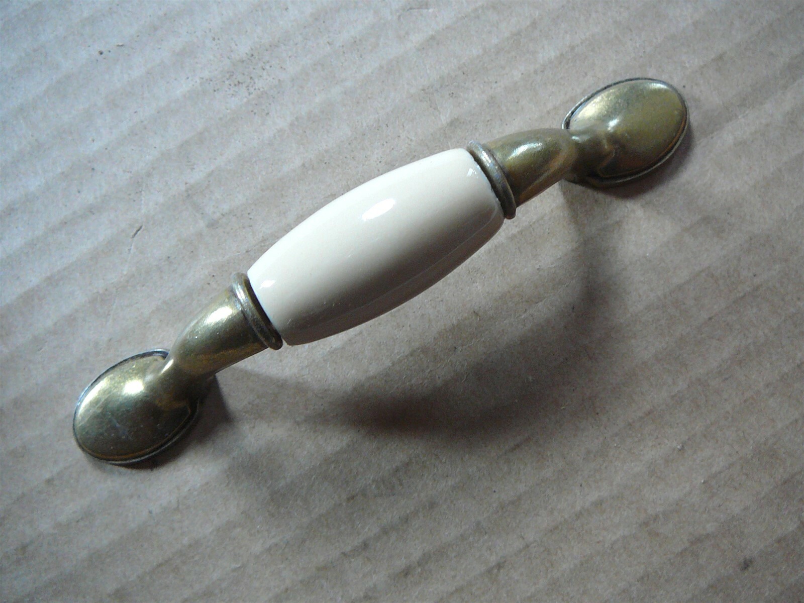 SET of TWELVE BRASS TONE METAL & BEIGE WHITE DRAWER DOOR PULLS Vintage 3″CL NWOB