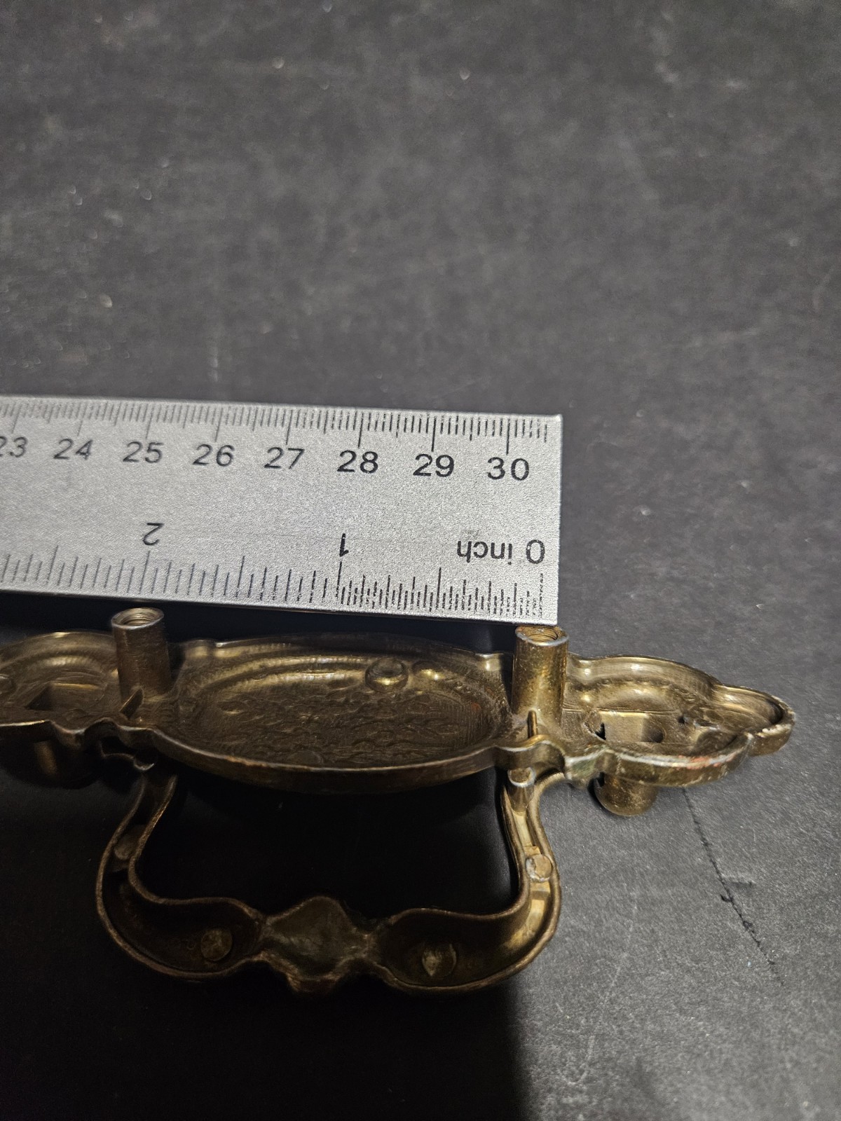 Vintage Bail Pull Features An Ornate Oval Backplate With Floral Design