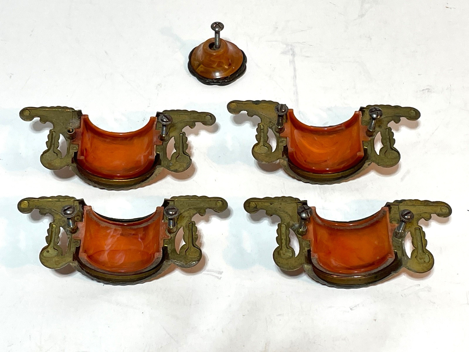 ANTIQUE SET OF FOUR BRASS / BAKELIGHT BUTTERSCOTCH DRESSER HANDLES