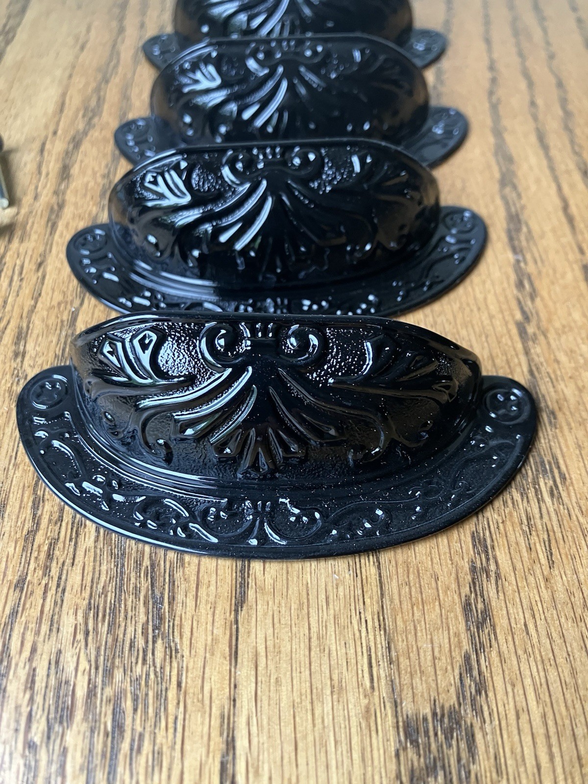 Lot of 4 Black Ornate Metal Cabinet Drawer Cup Pulls 2 1/2 Centers 3 7/8″ Long.