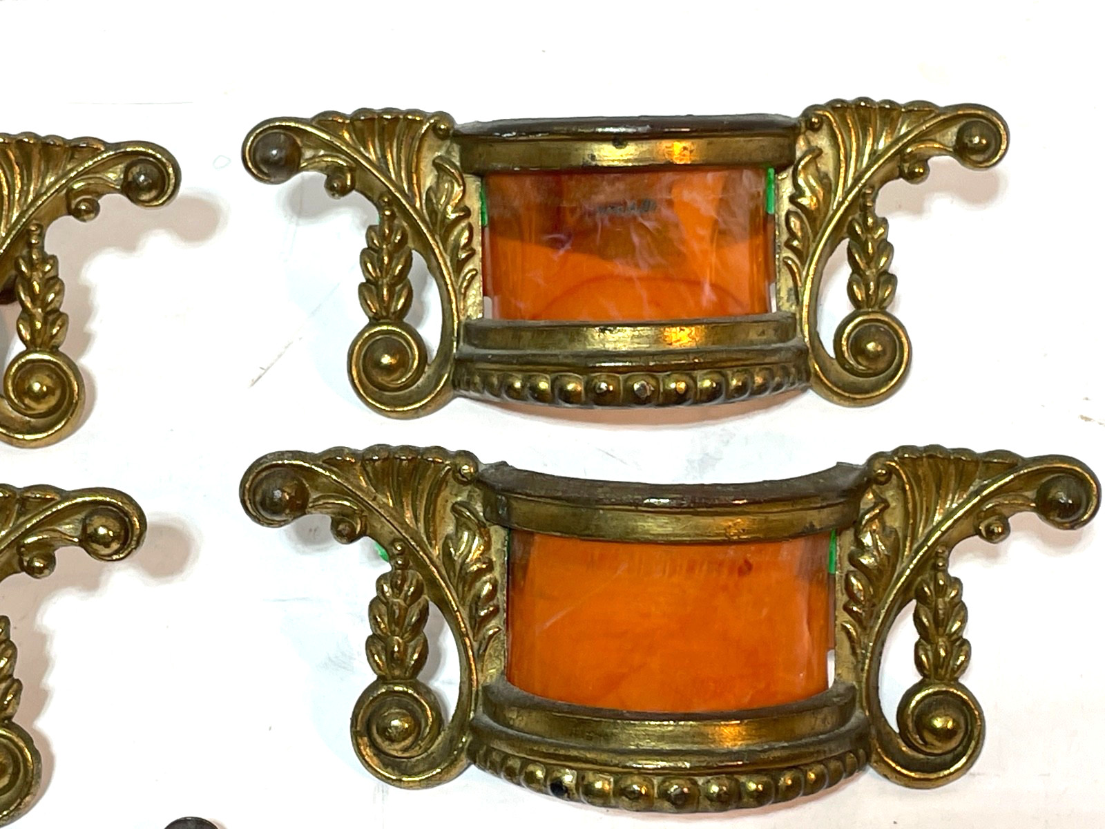 ANTIQUE SET OF FOUR BRASS / BAKELIGHT BUTTERSCOTCH DRESSER HANDLES
