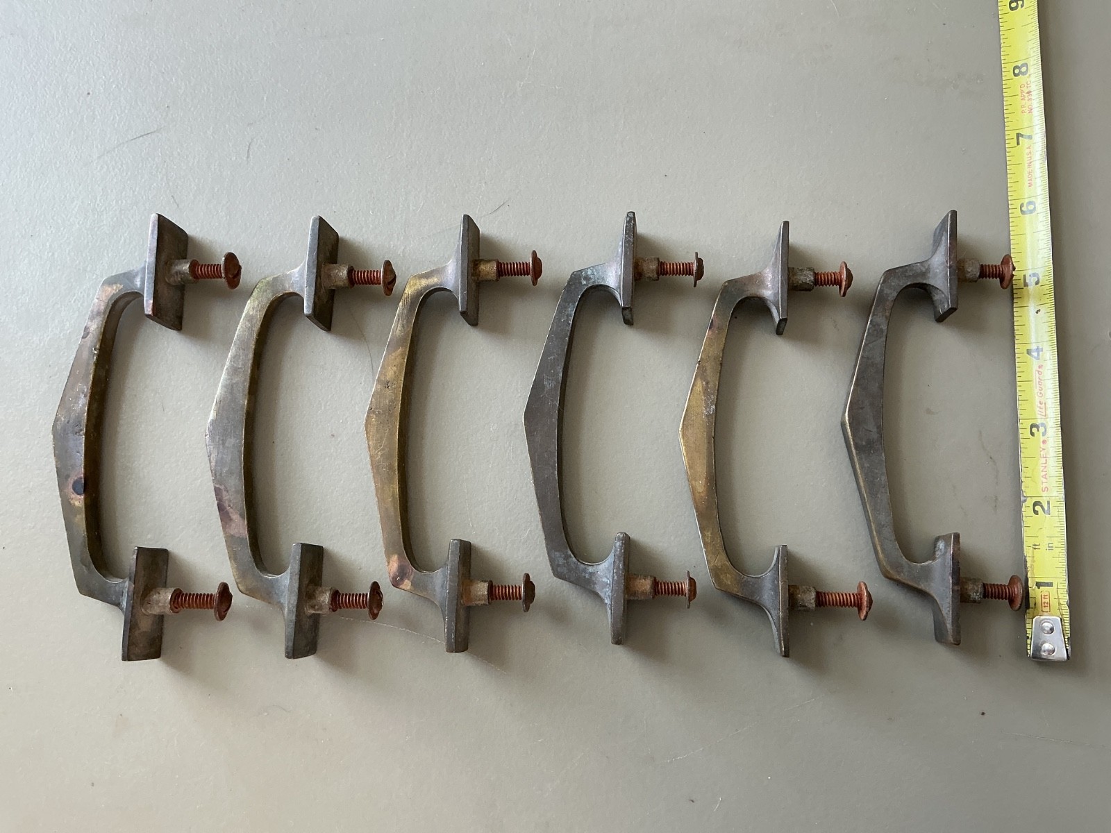 Set of 6 Vintage/antique heavy brass handles with original screws. “5 1/2 long