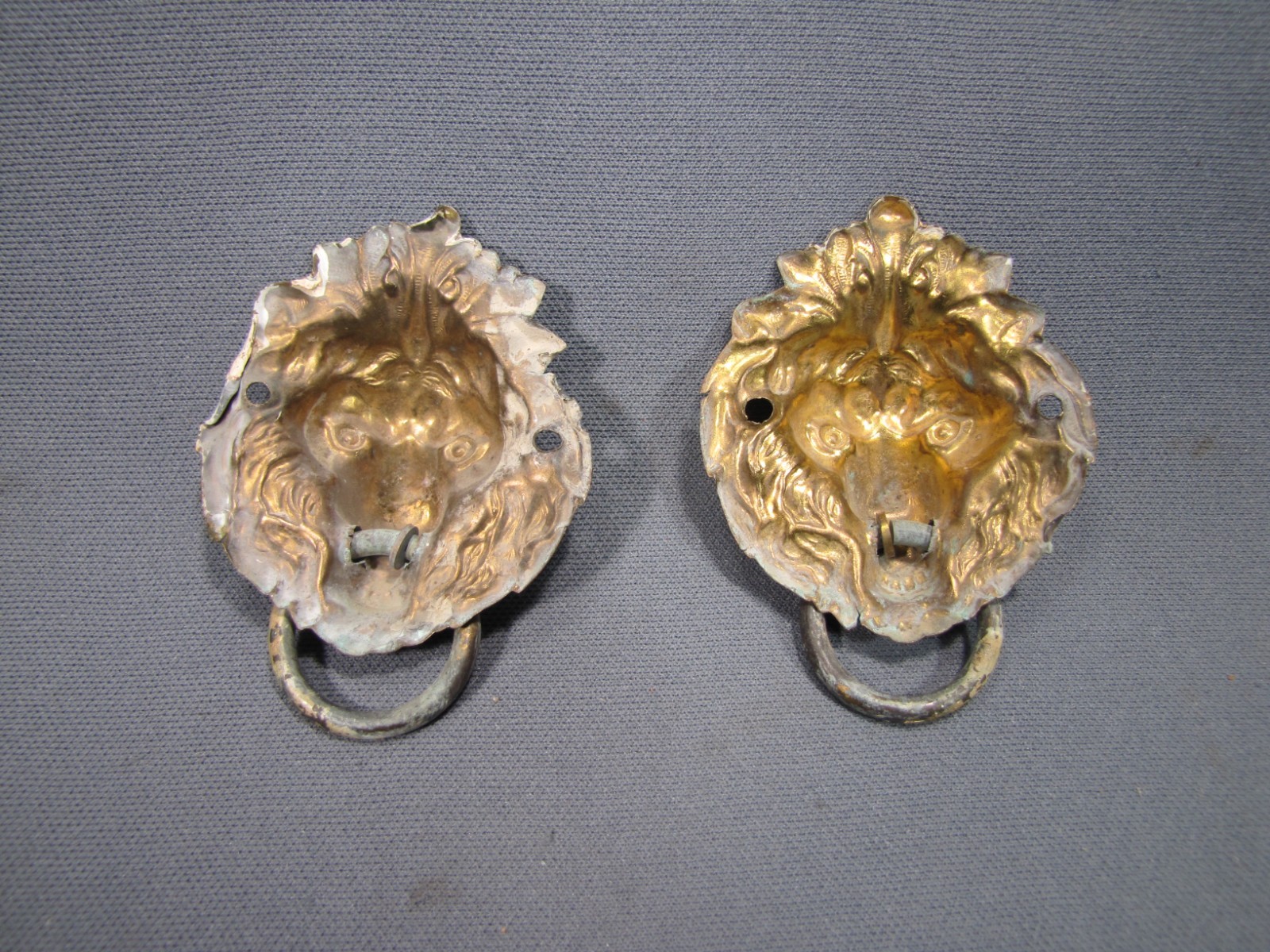2 antique stamped brass lionhead drawer pulls with Ring